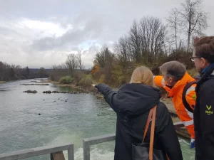 Partners from TUM at a dam on the River Iller